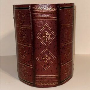 Beautiful leather bound faux book spine waste can trash can.